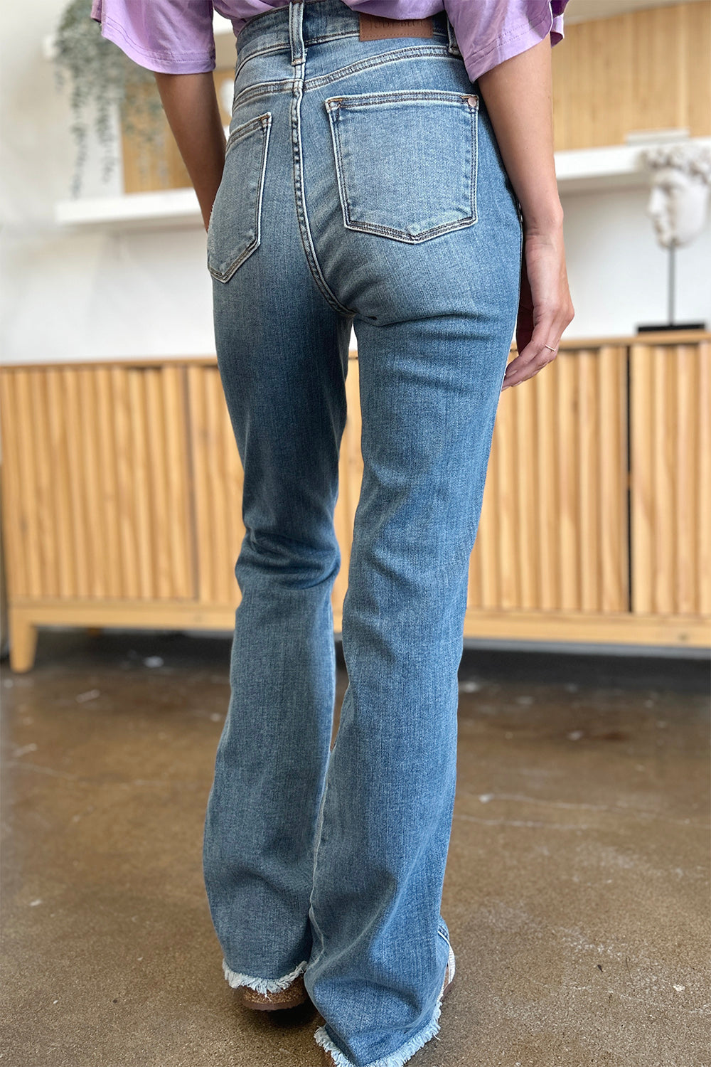 Judy Blue Full Size Distressed Raw Hem Bootcut Jeans - Corinne's Boutique