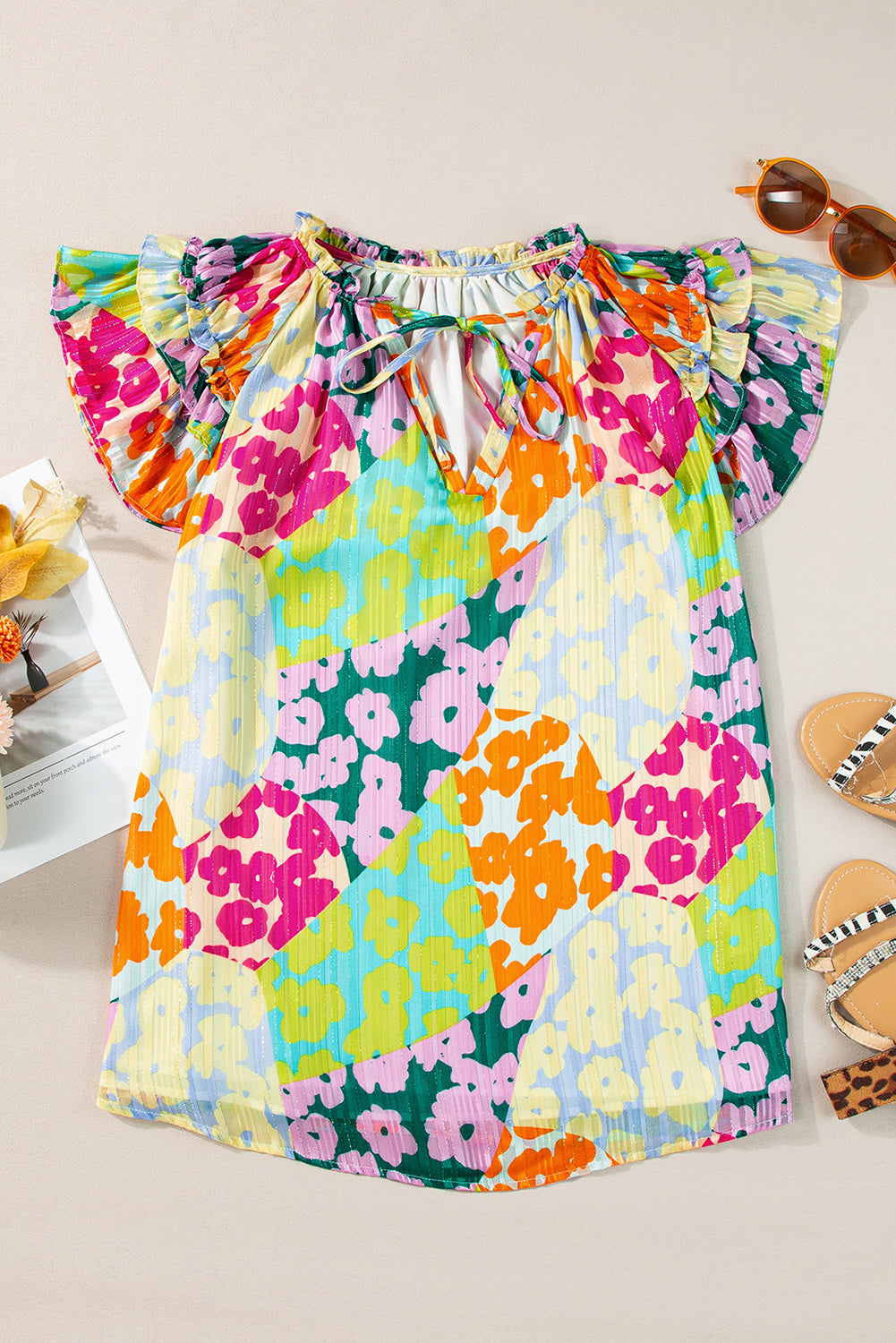 Ruffled Printed Tie Neck Cap Sleeve Blouse - Corinne's Boutique