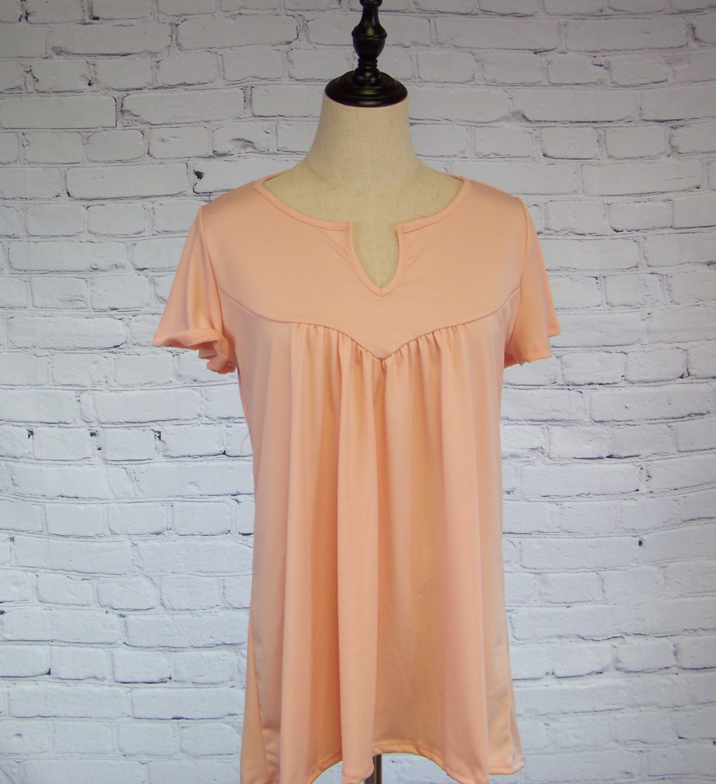 Baby doll Knit Top with Notched Neck Line - Corinne's Boutique